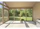 Screened-in porch area perfect for enjoying the beautiful backyard views and outdoor relaxation at 11875 W 700 S, Columbus, IN 47201