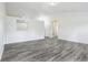 Open concept living space with modern flooring and ample natural light at 12250 Longstraw Dr, Indianapolis, IN 46236