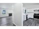 Open concept living with modern appliances and flooring at 12250 Longstraw Dr, Indianapolis, IN 46236