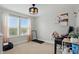 Well-lit bedroom featuring two large windows, neutral walls, and versatile space at 1281 Jesse Ct, Greenwood, IN 46143