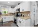 Stylish kitchen featuring granite counters, stainless appliances, and mosaic backsplash at 1281 Jesse Ct, Greenwood, IN 46143
