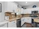 Stylish kitchen featuring granite counters, stainless appliances, and mosaic backsplash at 1281 Jesse Ct, Greenwood, IN 46143