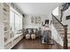 Cozy living room featuring hardwood floors, built-in shelving, and comfortable seating at 1281 Jesse Ct, Greenwood, IN 46143
