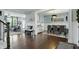Open-concept living and dining rooms showcasing hardwood floors and stylish decor at 1281 Jesse Ct, Greenwood, IN 46143