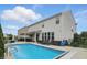 Beautiful backyard with a refreshing in-ground pool and ample space for lounging and entertaining at 1281 Jesse Ct, Greenwood, IN 46143