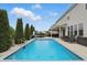 Beautiful inground pool surrounded by lawn and backyard, perfect for outdoor entertaining at 1281 Jesse Ct, Greenwood, IN 46143