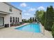 Refreshing backyard pool and lounge area, perfect for relaxing and entertaining outdoors at 1281 Jesse Ct, Greenwood, IN 46143