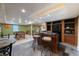 Finished basement with wet bar, seating, pool table and ample space for recreation at 13271 Aquamarine Dr, Carmel, IN 46033