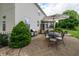 Charming brick patio with outdoor seating and grill, perfect for entertaining at 13271 Aquamarine Dr, Carmel, IN 46033