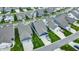 An aerial view of a neighborhood with beautiful single-Gathering homes featuring attached garages and manicured lawns at 1364 Chatham Hills Blvd, Westfield, IN 46074