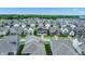 Aerial view of a vibrant neighborhood showcasing well-maintained homes and green spaces at 1364 Chatham Hills Blvd, Westfield, IN 46074