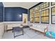 Comfortable covered patio with cozy furniture, perfect for outdoor relaxation and entertaining at 1364 Chatham Hills Blvd, Westfield, IN 46074