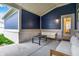 Cozy covered patio with seating, ideal for relaxing and enjoying the outdoors at 1364 Chatham Hills Blvd, Westfield, IN 46074