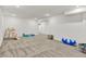 Spacious basement featuring carpet flooring and ample room for recreation and relaxation at 1364 Chatham Hills Blvd, Westfield, IN 46074