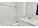Clean bathroom with white vanity, sink, and shower with curtain at 1364 Chatham Hills Blvd, Westfield, IN 46074