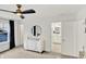Bedroom with dresser, round mirror, and ensuite bathroom access at 1364 Chatham Hills Blvd, Westfield, IN 46074
