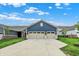 Beautiful home with a three-car garage and large driveway, ideal for convenience and storage at 1364 Chatham Hills Blvd, Westfield, IN 46074