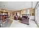 Entertaining basement with a wet bar, fireplace, and comfortable seating provides ample space for gatherings and relaxation at 14711 Macduff Dr, Noblesville, IN 46062