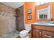 Bathroom with a stand-up shower and vanity with sink, toilet and mirror at 14711 Macduff Dr, Noblesville, IN 46062