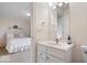 Bathroom that connects to bedroom features a marble top vanity at 14711 Macduff Dr, Noblesville, IN 46062