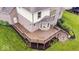 Exterior angle of home with deck and landscaping at 14711 Macduff Dr, Noblesville, IN 46062