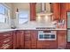 Modern kitchen featuring stainless steel appliances, sleek countertops, and ample cabinet space offers a chef's dream at 14711 Macduff Dr, Noblesville, IN 46062