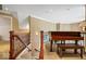 Loft space with piano, offering a view of the home's interior at 14711 Macduff Dr, Noblesville, IN 46062