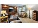 Cozy living room with built-in shelves, comfortable seating, and a warm, inviting atmosphere at 1495 E 240 N, Anderson, IN 46012
