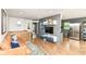Open concept living room with hardwood flooring, comfortable seating, and a stylish, modern design at 1513 Alimingo Dr, Indianapolis, IN 46260