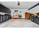 Spacious garage with ample storage cabinets and work area for projects and organization at 1539 Hazy Falls Blvd, Westfield, IN 46074