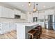 Modern kitchen with stainless steel appliances, large island, and ample counter space at 1539 Hazy Falls Blvd, Westfield, IN 46074