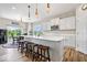 Bright kitchen featuring an island with stool seating, stainless appliances, and ample countertops at 1539 Hazy Falls Blvd, Westfield, IN 46074