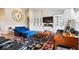 Inviting living room with built-in shelving, television, and comfortable seating arrangement at 1539 Hazy Falls Blvd, Westfield, IN 46074
