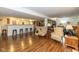 Open basement area with a bar and seating area. Partially furnished with comfortable seating and modern design at 16126 Hymera Green, Westfield, IN 46074