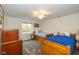 Bright bedroom features twin beds, and a window for natural light. The perfect space for rest at 16126 Hymera Green, Westfield, IN 46074