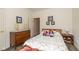 Inviting bedroom featuring a cozy bed, wood furniture, soft lighting, and an inviting atmosphere at 16126 Hymera Green, Westfield, IN 46074
