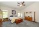Bright bedroom with vaulted ceiling featuring a ceiling fan, soft carpet, and cozy decor and furnishings at 16126 Hymera Green, Westfield, IN 46074