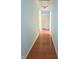 Hallway features linoleum flooring and light blue painted walls at 1706 Reverend J.T. Menifee St, Anderson, IN 46016