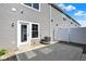Exterior view of the backyard, showcasing a concrete patio and gray siding at 19450 Northwest Dr, Westfield, IN 46074