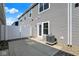 Backyard featuring a concrete patio, a white privacy fence, and gray siding at 19450 Northwest Dr, Westfield, IN 46074