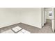 Cozy bedroom features neutral carpeting, leading to closet and bathroom at 19450 Northwest Dr, Westfield, IN 46074