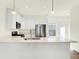 Well-lit kitchen featuring white cabinetry, modern appliances, and an open design at 19450 Northwest Dr, Westfield, IN 46074