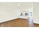 Spacious living area that connects to a kitchen with sleek countertops at 19450 Northwest Dr, Westfield, IN 46074