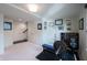 Basement gym with carpet flooring, weight-lifting equipment, and multiple access doors at 1972 Rhettsbury St, Carmel, IN 46032