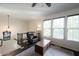 Cozy loft area features wood floors, lots of natural light and a comfortable leather chair at 1972 Rhettsbury St, Carmel, IN 46032