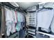 Organized walk-in closet with hanging racks, shelves, and compartments for shoes and accessories at 1972 Rhettsbury St, Carmel, IN 46032