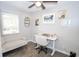 Bright home office with a modern desk, comfortable seating, and ample natural light at 2235 N Kenwood Ave, Indianapolis, IN 46208