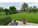 Back yard featuring a black chain link fence and lots of green space at 2330 Oak Dr, Clayton, IN 46118