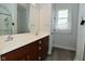 Bathroom with dual sinks, tile floor and shower with glass door at 2330 Oak Dr, Clayton, IN 46118