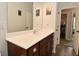 Bathroom with modern vanity and open doorway to laundry room at 2330 Oak Dr, Clayton, IN 46118
